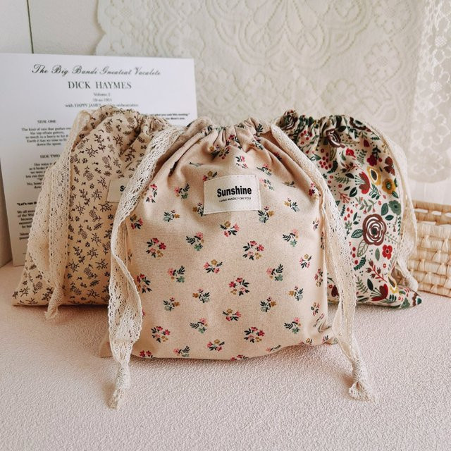 Beige Windeltasche aus Baumwolle als Organizer für Babyartikel und Kosmetik für unterwegs - Bild 1