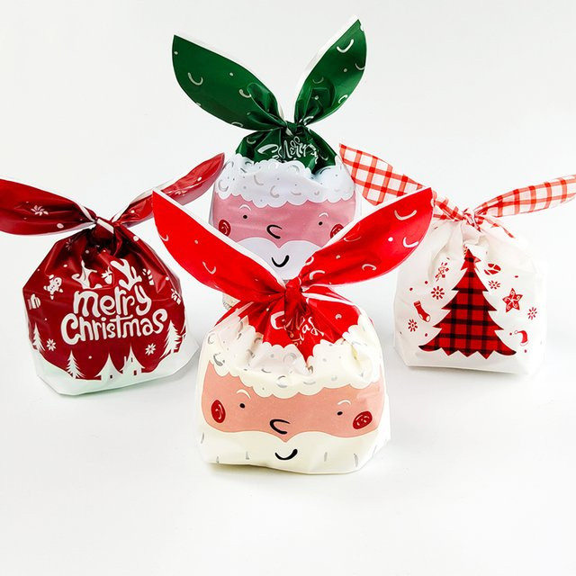 50 Stück Weihnachts-Geschenkbeutel aus Kunststoff mit Santa Claus Motiv für Süßigkeiten und Kekse - Bild 1