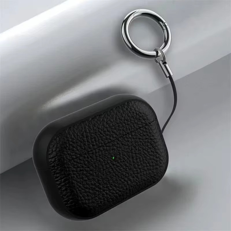 Leder-Textur Schutzhülle für Apple AirPods 1, 2, 3, 4 und AirPods Pro 1, 2 mit Anti-Verlust-Haken in Schwarz oder Orange - Bild 5