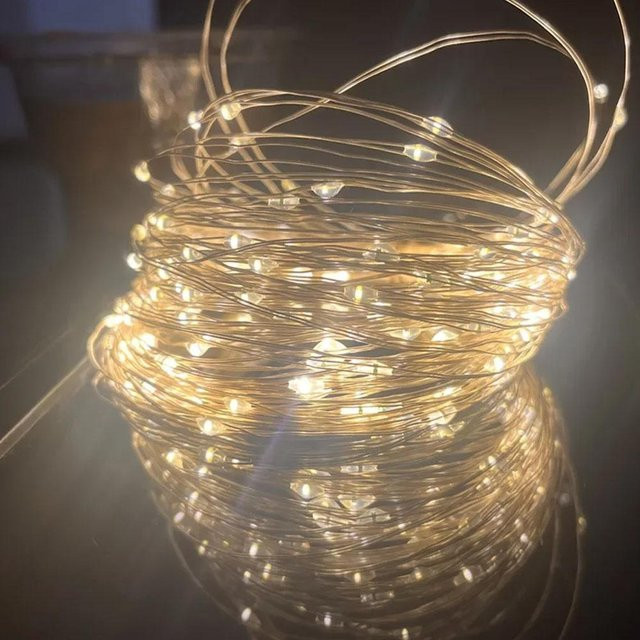 OuuZuu LED Lichterkette mit Fernbedienung und 8 Funktionen, USB-Betrieb, warmweiß, 20m - Bild 1