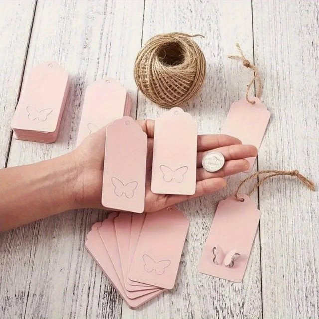 100 Stück Geschenkverpackungsetiketten aus Papier mit Schmetterlingsflügeln und gewelltem Rand in Weiß und Pink - Bild 1