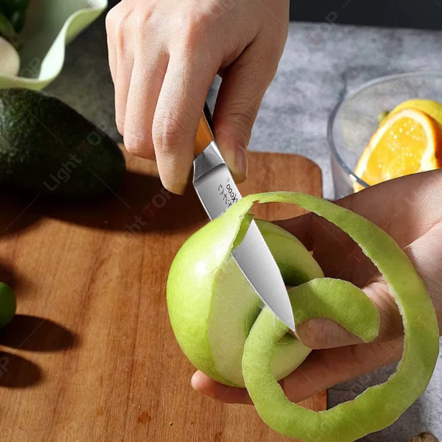 WXCOO Santoku Allzweckmesser aus Edelstahl in Silber mit Holzgriff - Bild 2