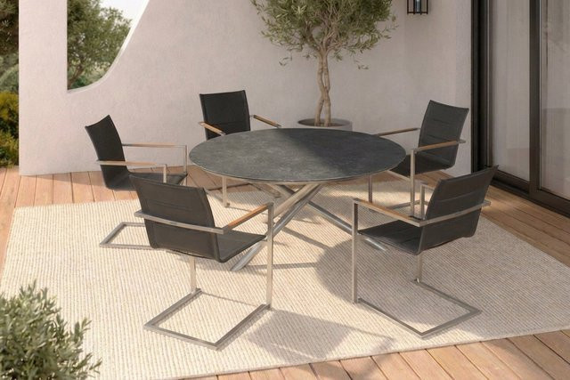 OUTFLEXX Garten-Essgruppe aus Edelstahl, Glaskeramik, Textilene und Teak in Silber/Schwarz/Grau mit rundem Tisch Ø 150 cm und 5 gepolsterten Freischwingerstühlen - Bild 1