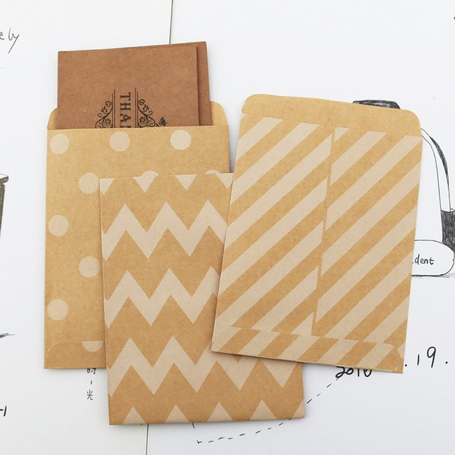 Vintage Kraftpapiertüten in Braun mit Aufklebern für Weihnachtsgeschenke und Party-Dekoration - Bild 1
