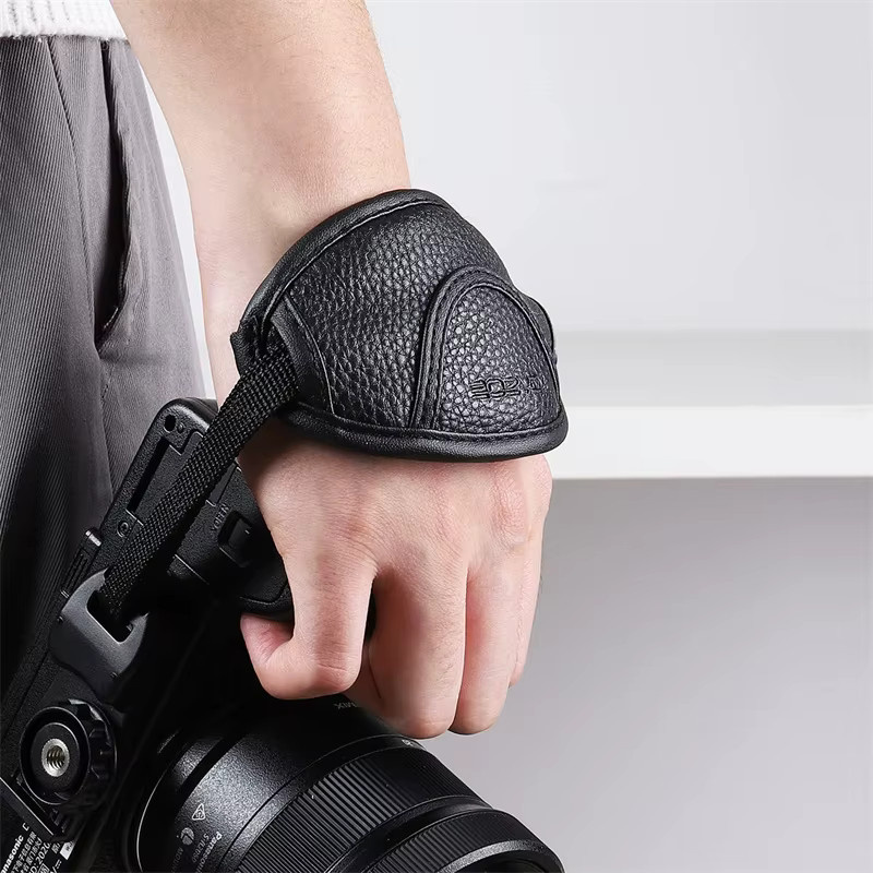 DIXSG Leder-Handgriff-Handschlaufe für DSLR-Kameras in Schwarz, passend für Nikon und Canon - Bild 3