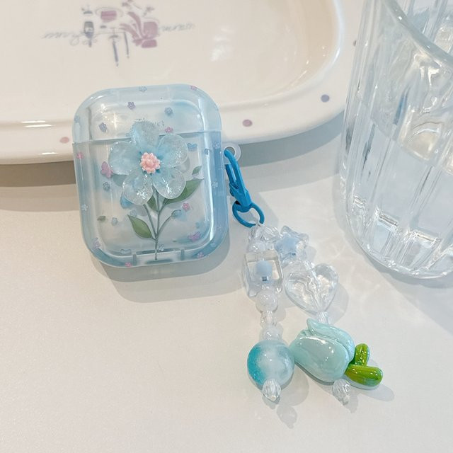 Transparente blaue AirPods Schutzhülle mit 3D-Glitzer-Blumen und Anhänger für Apple AirPods 1, 2, 3, 4 und Pro/Pro 2/Pro 3 - Bild 1