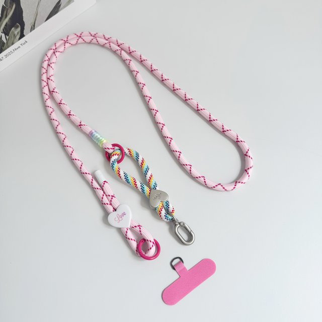 ZHANZHI Zwei-in-Eins Handyband in Pink mit verstellbarem herzförmigem Seil und Metallverschluss-Fingerschlaufe als universelles Anti-Verlust-Zubehör - Bild 1