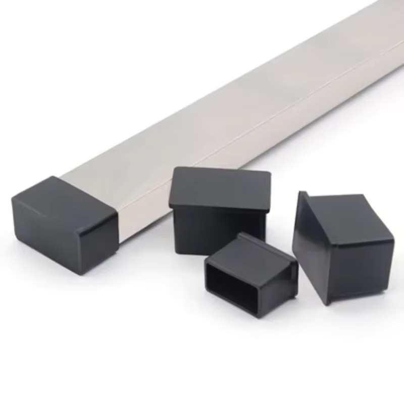 Rutschfeste rechteckige Stuhlbeinkappen aus Silikon in Schwarz als Bodenschoner für Tisch und Stuhlbeine - Bild 3