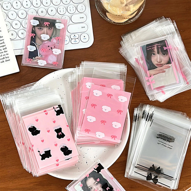50 Stück wiederverschließbare Zellophanbeutel mit rosa Schleife, selbstklebende durchsichtige Fotokartenhüllen und Geschenktüten für Hochzeiten oder Partys - Bild 1