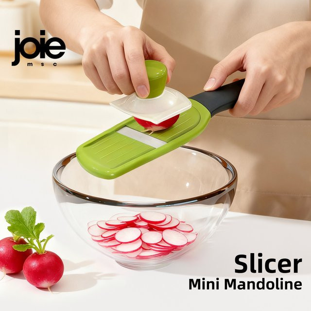 Joie Mini-Mandolinenschneider aus Edelstahl in Grün mit manuellem Handschutz für Gemüse und Obst - Bild 1