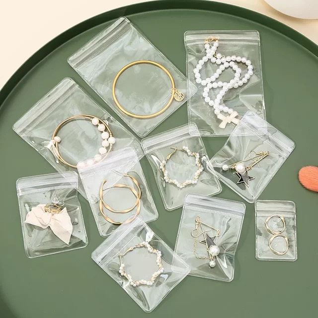 10 Stück Schmuck-Organizer-Taschen aus transparentem PVC mit Druckverschluss zur Aufbewahrung von Ohrringen, Anhängern, Halsketten und Armbändern - Bild 1