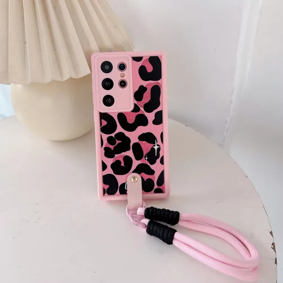 szHAIyu Soft Cover mit Handgelenk-Strap für Samsung Galaxy S25 S24 Ultra S23 S21 FE A56 A55 A54 A53 A36 A35 A34 A26 A25 A24 A16 A15 in Schwarz oder Pink - Bild 1