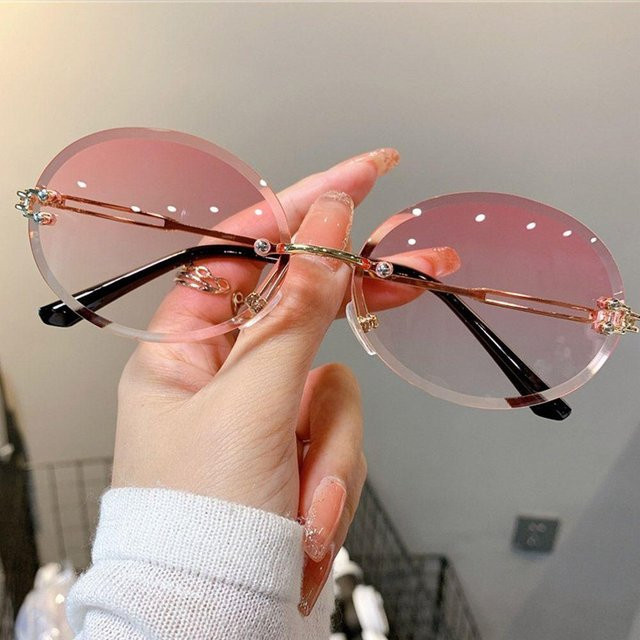 Ovale Sonnenbrille, randlos, Metall, Pink Brown, Unisex - Bild 1