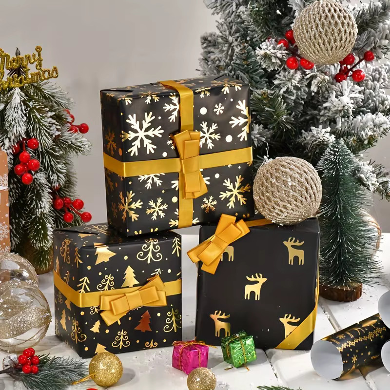 6er-Pack Weihnachts-Geschenkpapier in Schwarz und Gold mit Rentier- und Schneeflocken-Design aus glänzender Folie - Bild 3