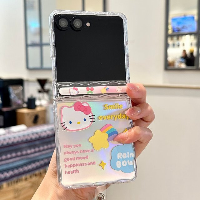 Samsung Z Flip7 Handyhülle mit Cartoon-Regenbogen-Erdbeer-Hello-Kitty-Design, Wellenfalten-Scharnier, Handkette und Fallschutz, Mehrfarbig - Bild 1