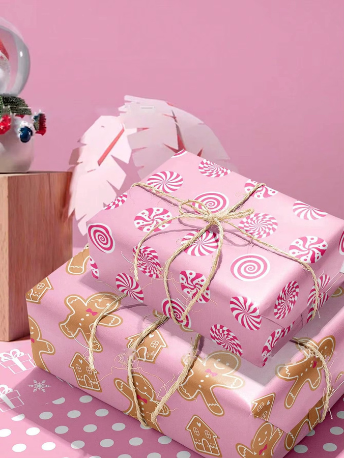 12 Blatt Weihnachts-Geschenkpapier in Pink mit Schneeflocken- und Lebkuchenmann-Muster, B: 70 cm, T: 51 cm - Bild 1