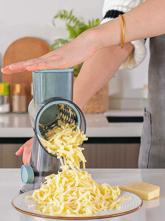 KEMORELA 3-in-1 rotierende Käsereibe mit Behälter in Rot – Multifunktionaler manueller Lebensmittelschneider und Nussmühle für Gemüse und Knoblauch - Bild 5