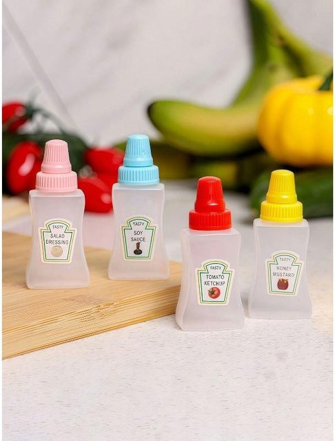 The Red Sun Mini-Saucenflaschen Set aus Kunststoff, 4er-Pack, Mehrfarbig, Tragbare Quetschbehälter für Ketchup, Öl, Sojasauce, Honig und Salatdressing - Bild 1