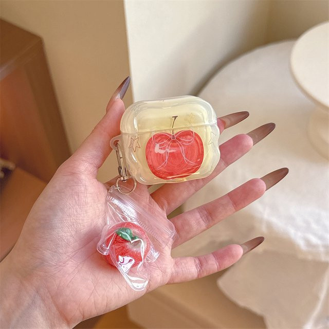 Silikon Schutzhülle mit Apple Muster und Anhänger für AirPods 4, 3, 2 und Pro in Rot - Bild 1