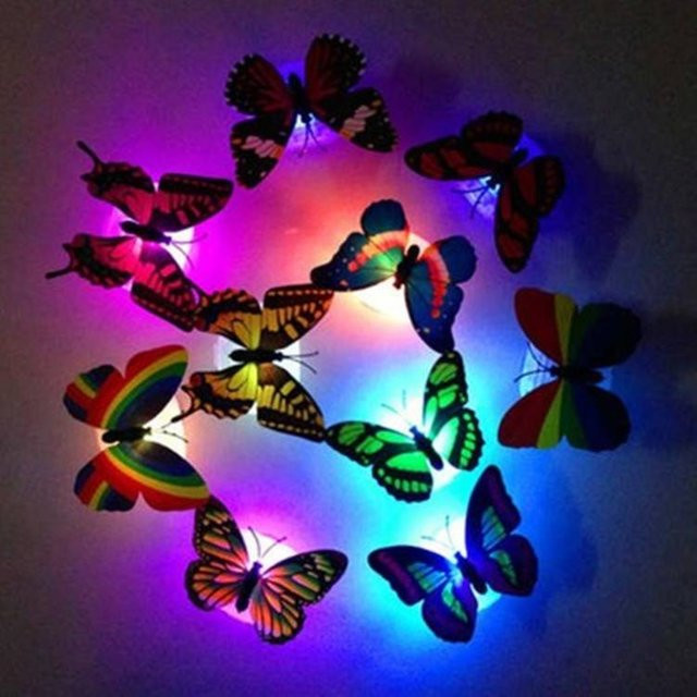 12 Stück Leuchtende 3D-Schmetterlinge Wandaufkleber von Yiran toy in Purple und Mehrfarbig - Bild 1