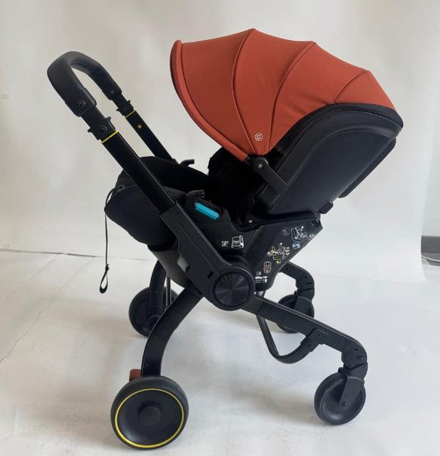 Multifunktionale Babywiege und Kinderwagen von BabyBloom Shop in Orange, faltbar mit drehbarem Sitz für 0-12 Monate - Bild 1