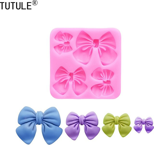 TUTULE Silikonform Schmetterlingsknoten in Pink für Schokolade und Süßigkeiten zur DIY Dekoration - Bild 1