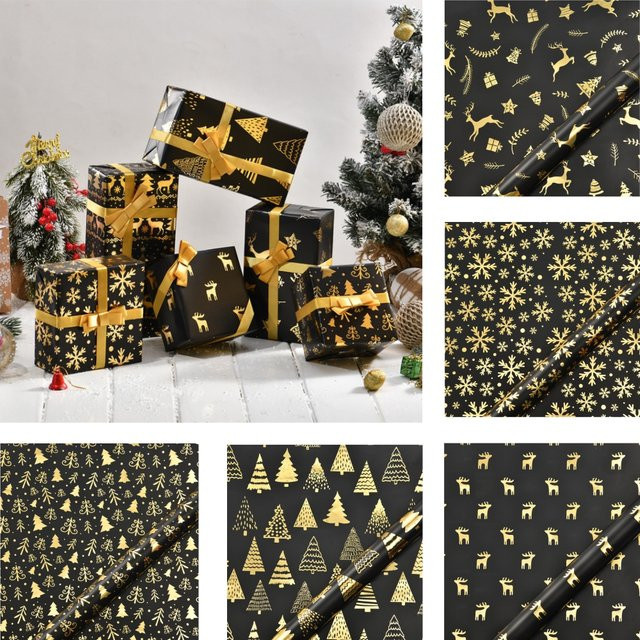 Schwarzgoldenes Weihnachtsgeschenkpapier mit Schneeflocken und Weihnachtsbaum, B/H: 50 x 70 cm - Bild 1