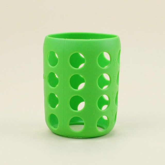 Tread Tribe Silikonhülle für Glas-Babyflaschen in Green, Durchmesser: 6,0 cm - Bild 1