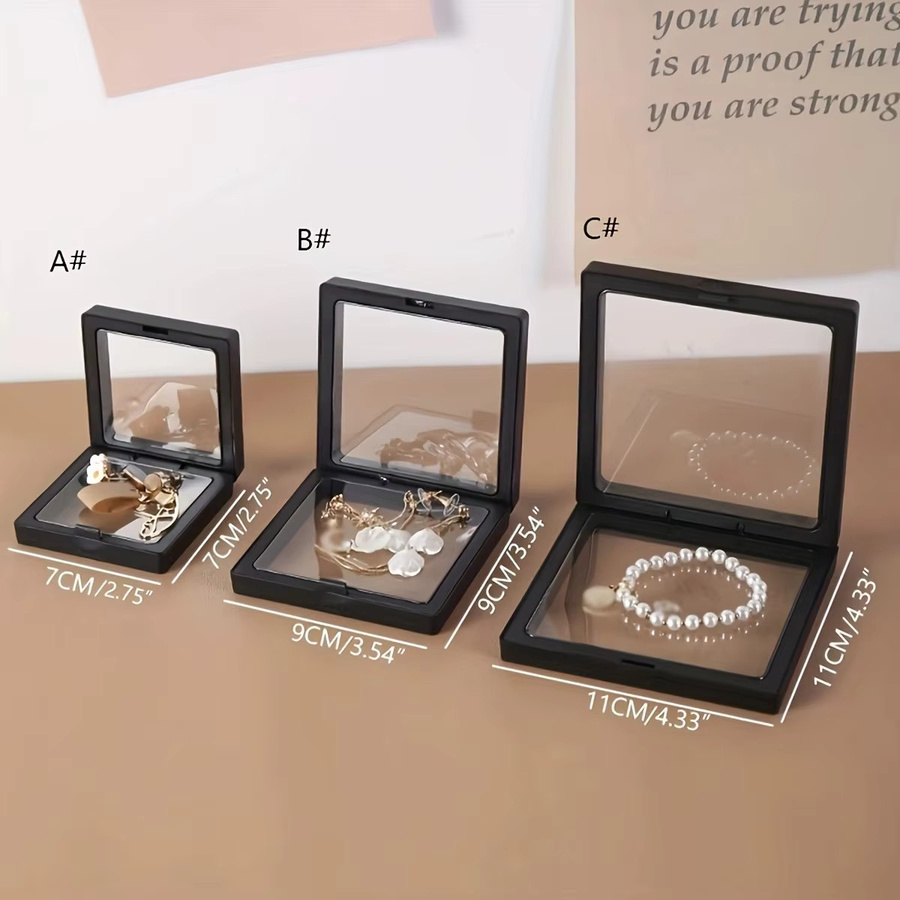 10 Stück Transparente Schwebe-Displayboxen aus Kunststoff für Schmuck, Ringe und Münzen in Schwarz - Bild 2