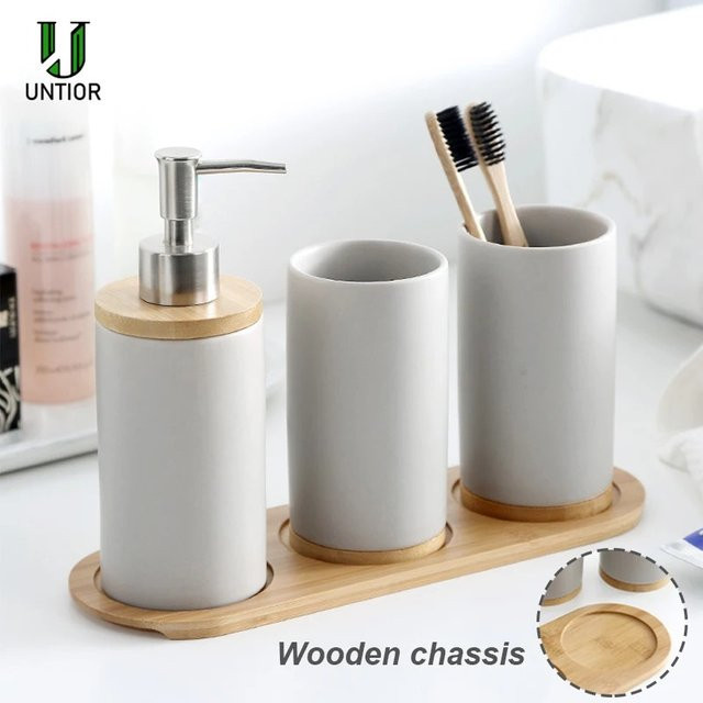 Untior Badezimmer Zubehör Set aus Keramik mit Seifenspender, Zahnbürstenhalter und Tumbler in Grau und Weiß - Bild 1