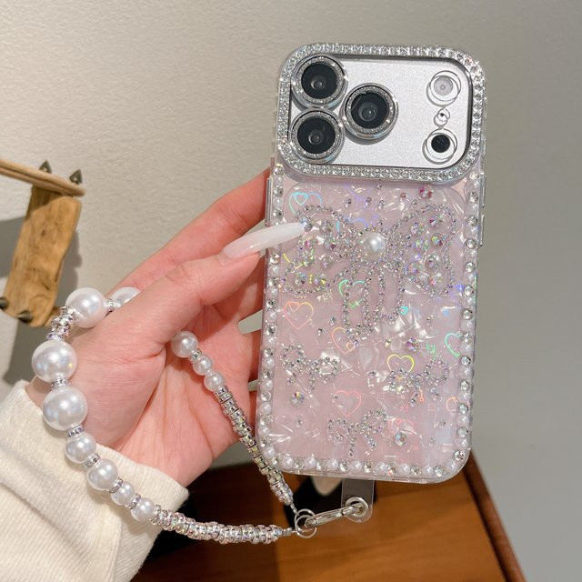 Yoshikichi Tsubo Handyhülle mit Herz-Muschel-Muster und Strass für iPhone in Pink inklusive Armband und diamantbesetzter Abdeckung - Bild 1