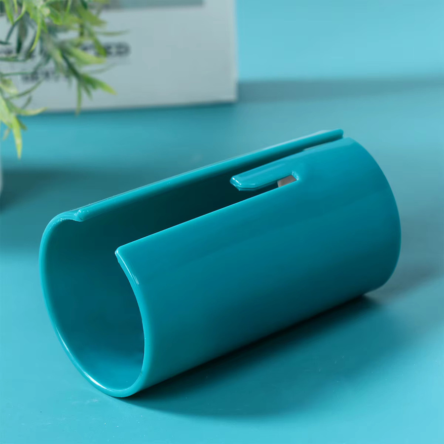 Tragbarer Mini Geschenkpapier Cutter in Türkis aus Kunststoff - Bild 4