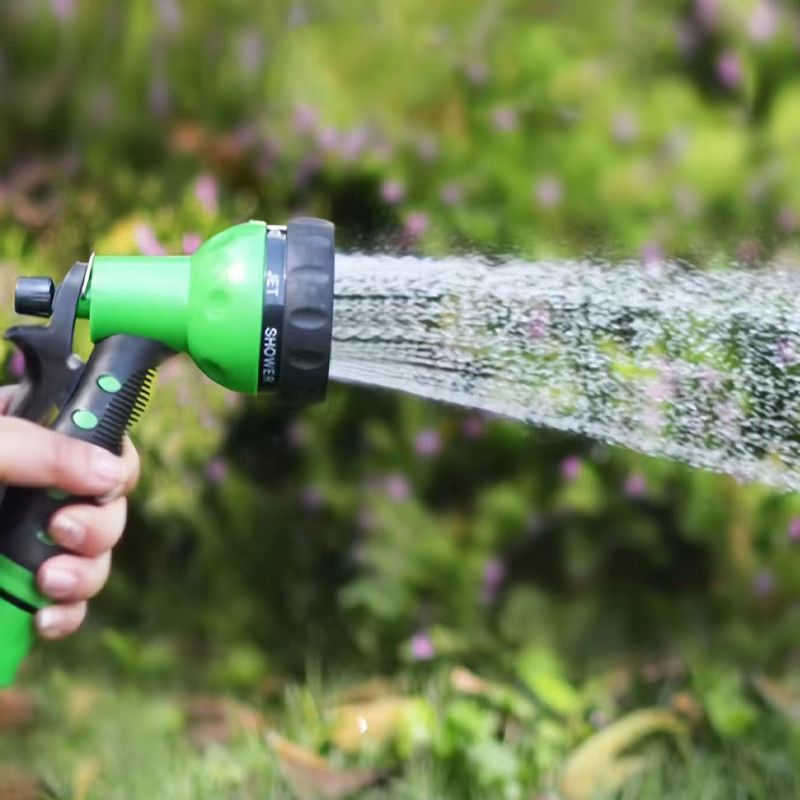 FLOWERS SPRAL Gartenschlauch-Set mit 7-Funktionen-Wasserpistole und grünem EVA-Spiralschlauch zur Reinigung und Bewässerung - Bild 5
