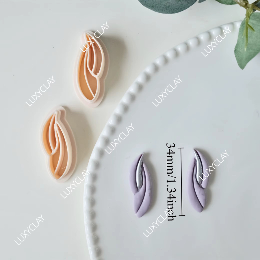 2 Stück geprägte Blätter-Ohrring-Formen aus Ton in Multicolour zum Basteln von Schmuck und Anhängern - Bild 1