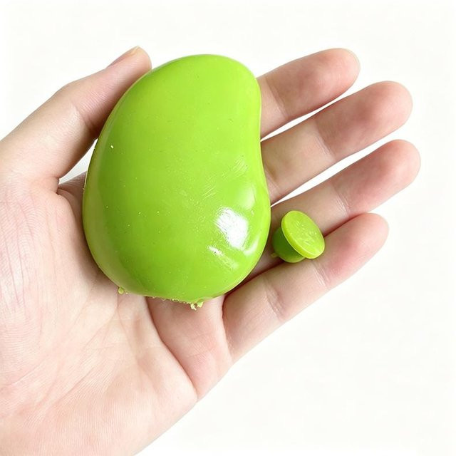 Binchi Outdoor Equipment Farbwechselndes Squishy Mangoschale, Stressball, green - Bild 1