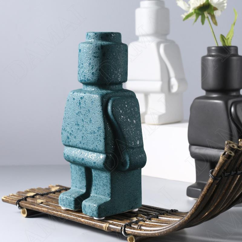 Moderne Harzstatue Mann von Yiran Furniture als kreative Blumenvase für dein Wohnzimmer in Schwarz - Bild 1