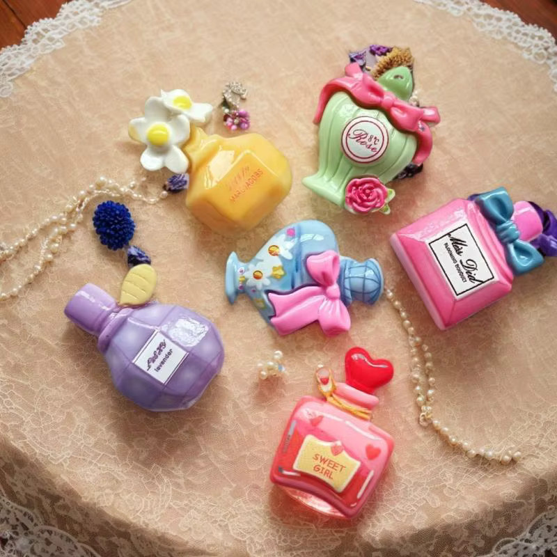 10 Stück Harz-Cartoon-Parfümflaschen für Scrapbooking und DIY-Schmuck - Bild 1