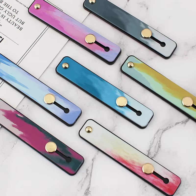 Multifunktionaler tragbarer Push-Pull Handyhalter mit Ring und Schnalle aus Silikon in Regenbogenfarben und Weiß - Bild 2