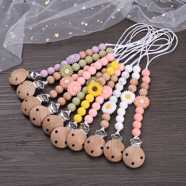 Schnullerhalter Kette für Babys aus Buche Holz und Silikon mit Blumenperlen in Mehrfarbig - Bild 1