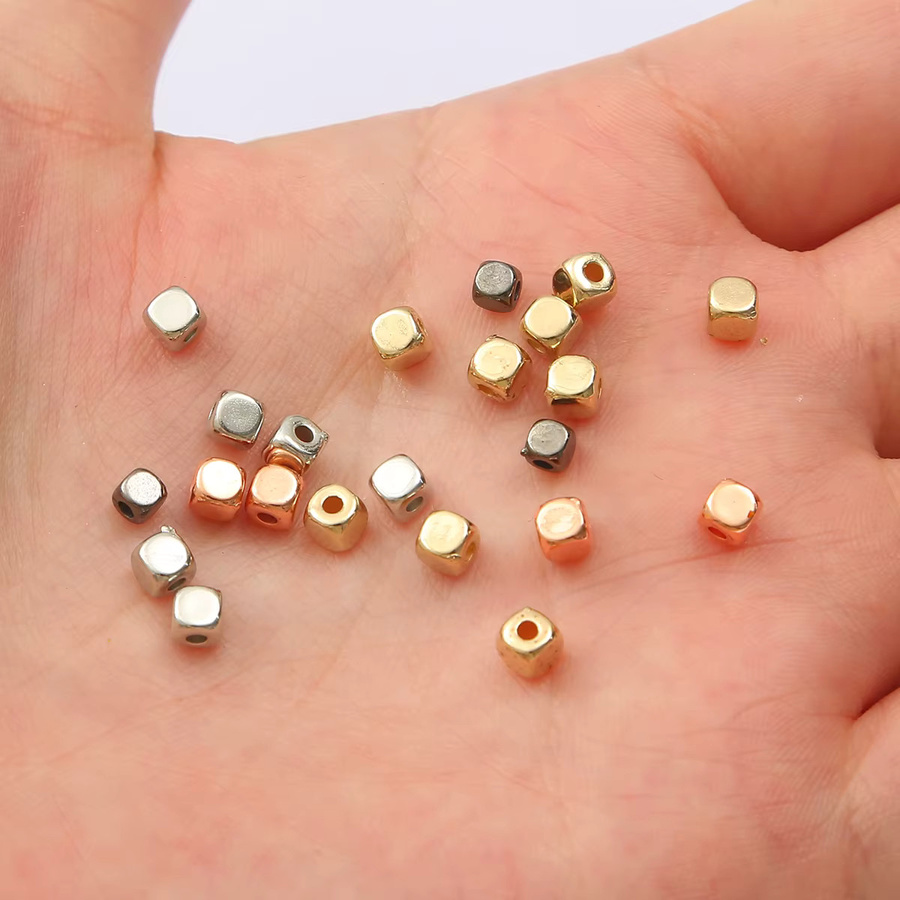 Distanzperlen Rocailles, quadratisch, 3–4 mm, Roségoldfarben, Unisex - Bild 3