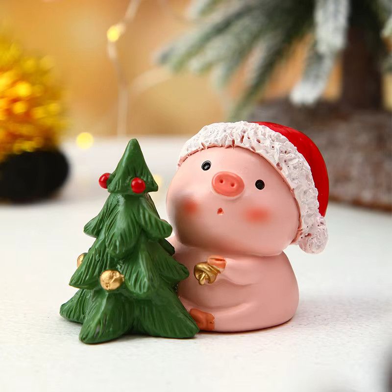 Kreative Weihnachtsdekoration aus Harz in Form eines rosa Schweins mit Weihnachtsbaum als Tischdekoration - Bild 2