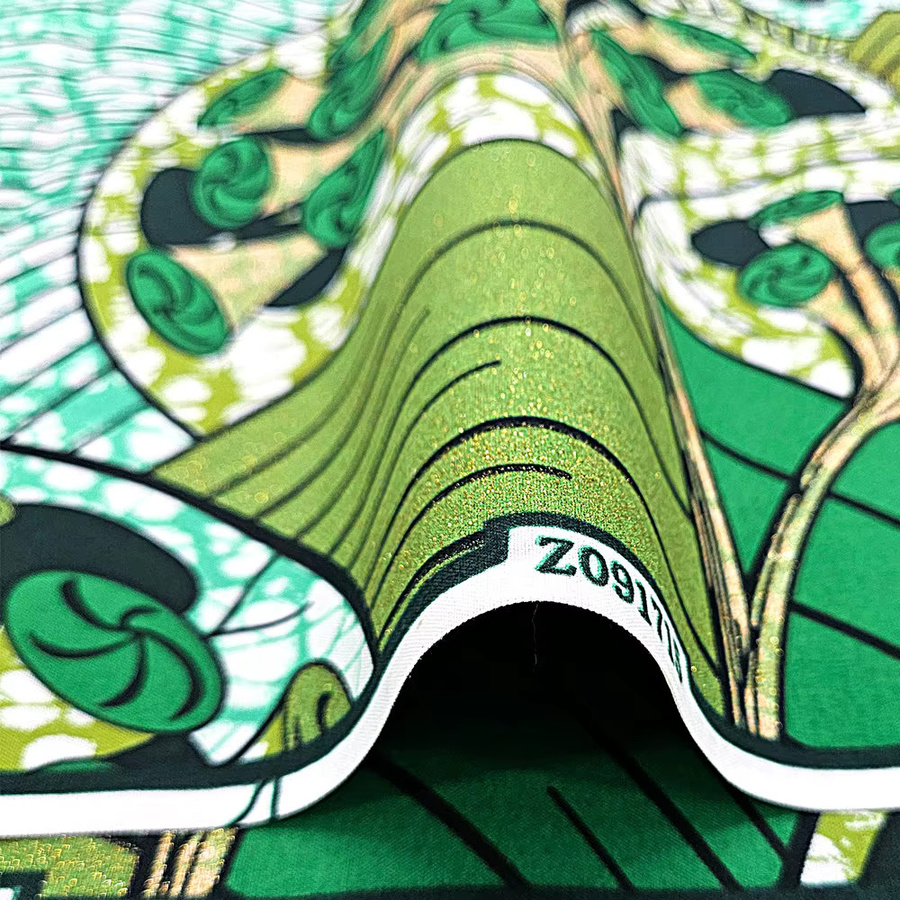 Glitzernder Wachsdruckstoff aus 100% Polyester in Gold und Grün für DIY-Bastelarbeiten und Nähen - Bild 2