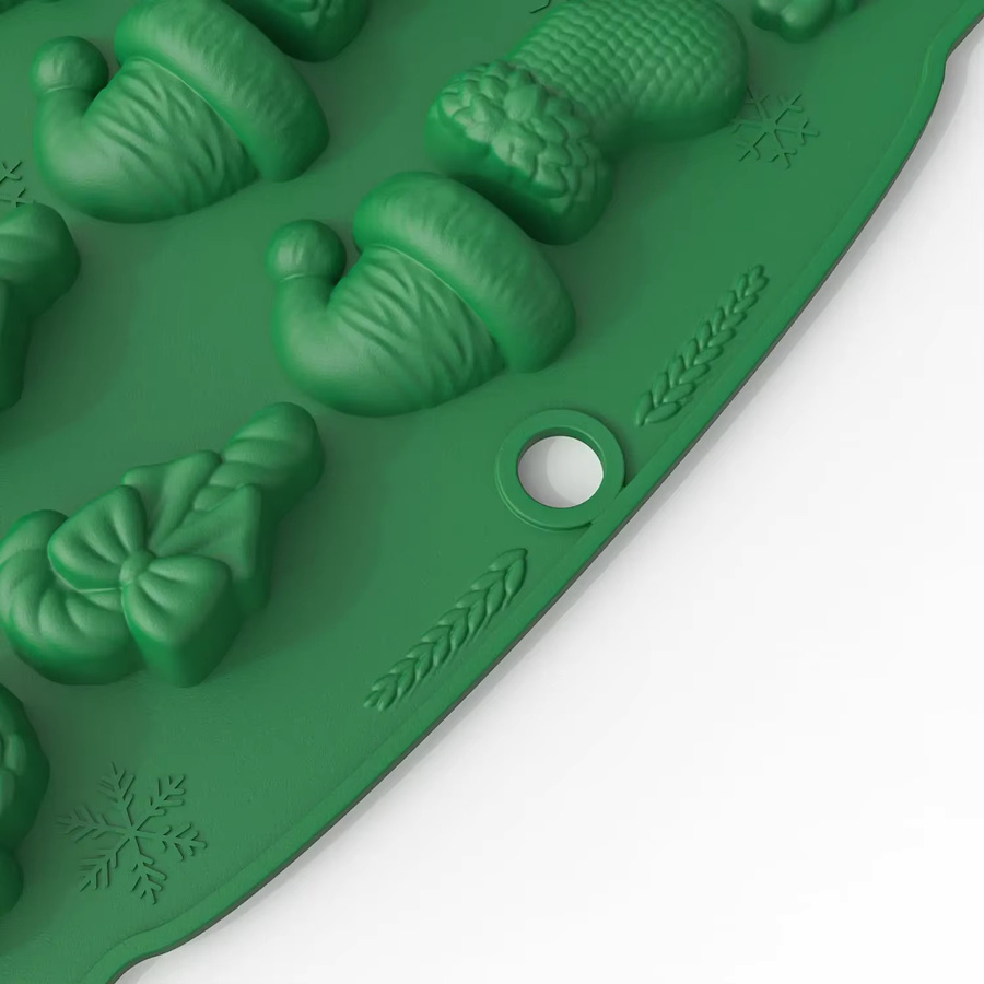 Silikon Backform für Schokolade und Gummy Candy mit Weihnachtsformen wie Lebkuchenmann, Baum und Schneemann, transparent und grün - Bild 4