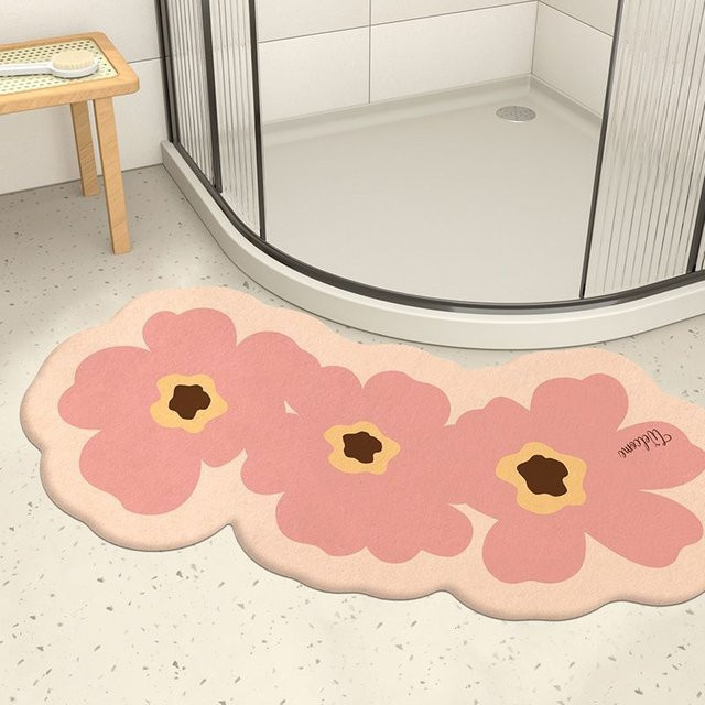 Rutschfeste und feuchtigkeitsableitende Badezimmermatte in Pink mit floralem Design, halbkreisförmig, B: 80 cm, T: 40 cm - Bild 1