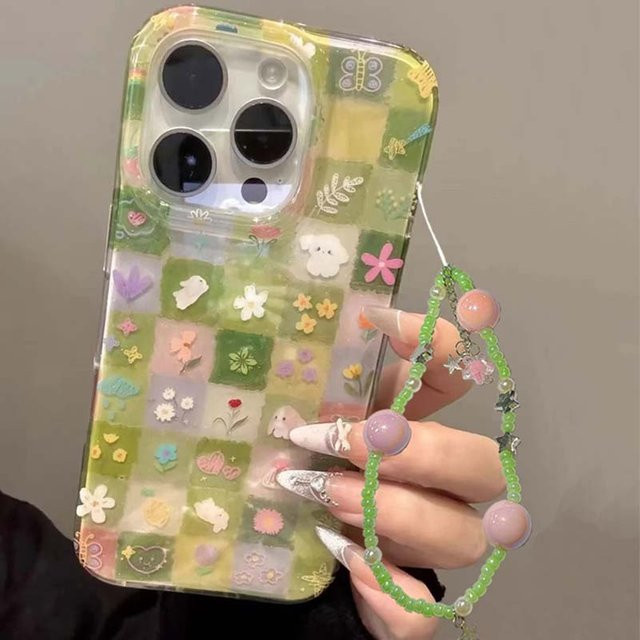 HAPPEE Handyhülle mit Kette für iPhone 11 bis 17 Pro Max in Grün mit Grasgittermuster und Blumen-Design - Bild 1
