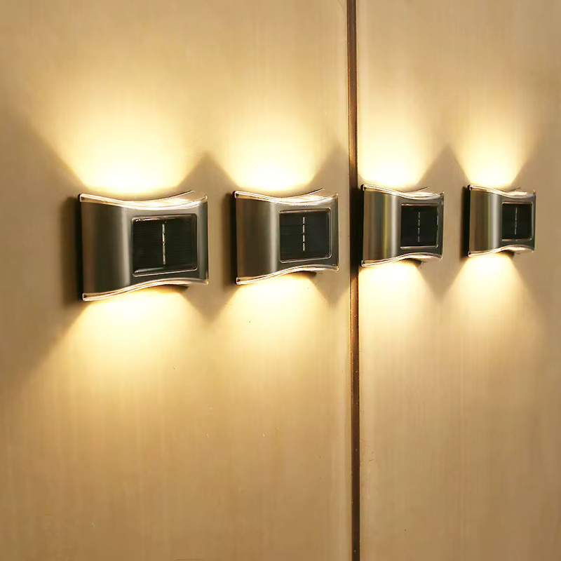 DOUWENXI Solar Wandleuchte aus Edelstahl in Silber mit Up/Down LED Beleuchtung, wasserdichte Außenwandleuchte für Garten und Zaun, Warmweiß - Bild 2