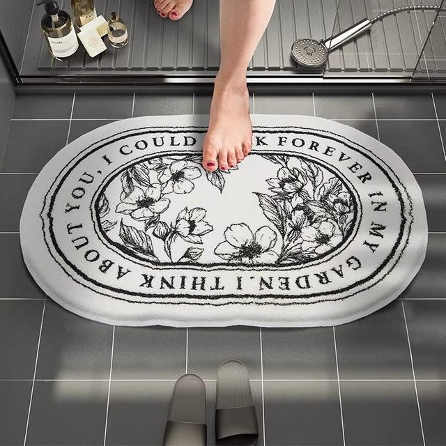 Saugfähige Anti-Rutsch-Badezimmermatte in Weiß mit floralem Design, B/B: 40 x 60 cm - Bild 1