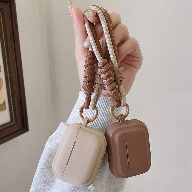 Silikonhülle für Apple AirPods Pro 2 und 3 sowie AirPods 4, 3, 2, 1 in Beige und Braun - Bild 1