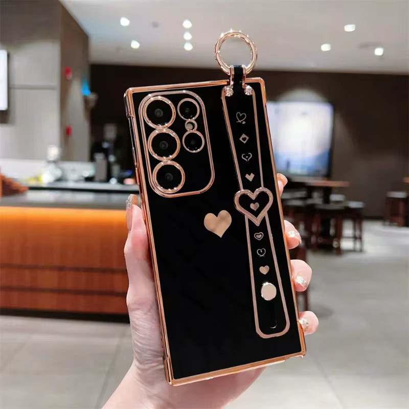 Glänzende Samsung Handyhülle mit Herzmuster und Armband-Halter in Weiß und Multicolour für S26 Ultra S25 S24 S23 S22 S21 FE Plus - Bild 1