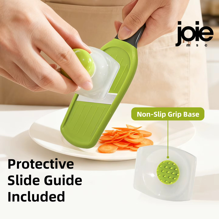 Joie Mini-Mandolinenschneider aus Edelstahl in Grün mit manuellem Handschutz für Gemüse und Obst - Bild 2